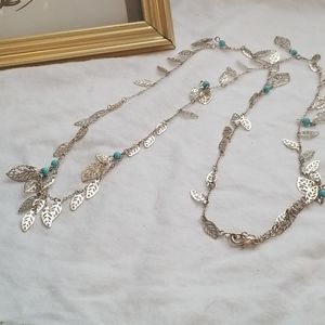 Long chain feather necklace